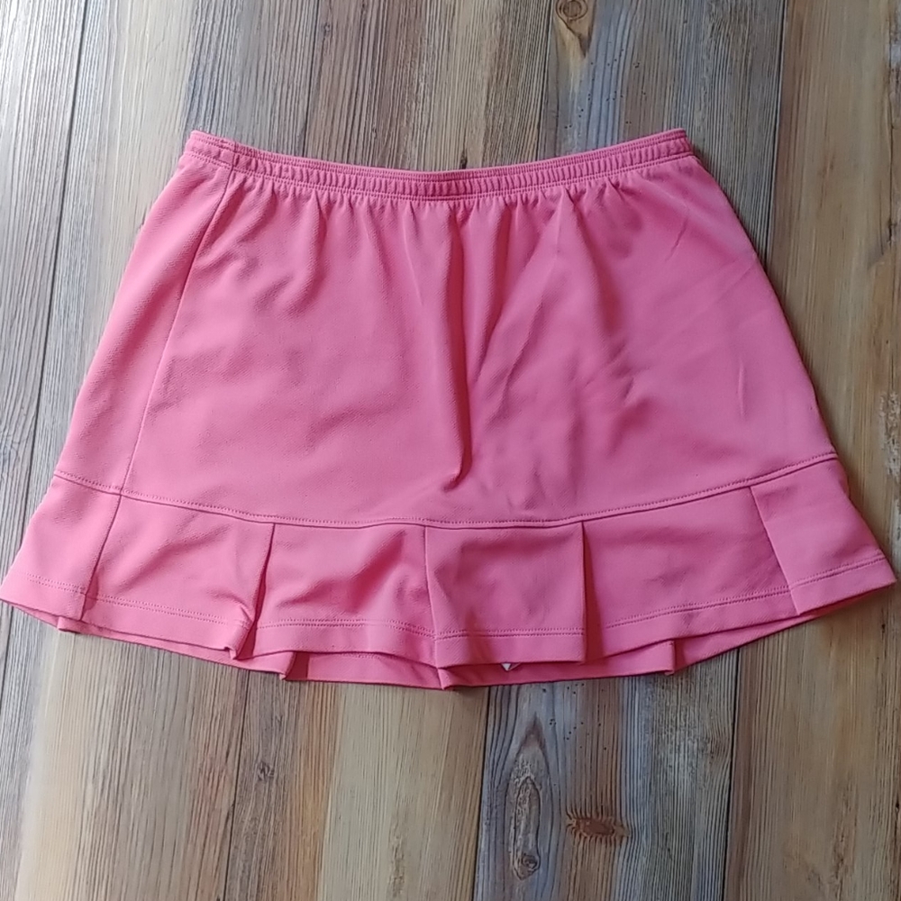 Coral pink golf, tennis, or active skort